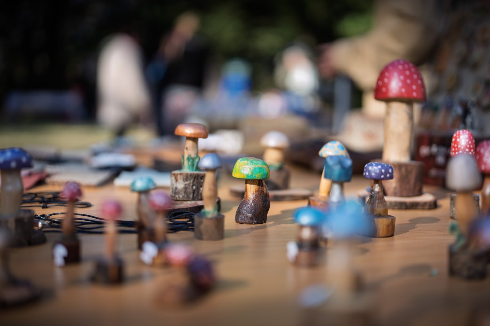 Colourful decorative mushroom ornaments on a Hogsback market table.